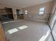 Unfinished bedroom with new flooring and large windows at 495 Bath Club N Blvd, North Redington Beach, FL 33708