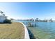Private dock extending into the water at 495 Bath Club N Blvd, North Redington Beach, FL 33708