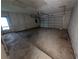 Unfinished garage with automatic door at 495 Bath Club N Blvd, North Redington Beach, FL 33708