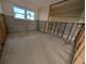 Unfinished kitchen with large windows and space for cabinets and appliances at 495 Bath Club N Blvd, North Redington Beach, FL 33708