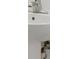 Small bathroom with pedestal sink and chrome faucet at 5152 Bay Isle Cir, Clearwater, FL 33760