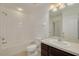 Bathroom with tub, toilet, and dark brown vanity at 5152 Bay Isle Cir, Clearwater, FL 33760