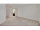 Bright bedroom featuring carpet and access to a private bathroom at 5152 Bay Isle Cir, Clearwater, FL 33760