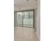 Dining room with chandelier and sliding glass doors at 5152 Bay Isle Cir, Clearwater, FL 33760