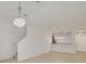 Bright dining room with stairs and kitchen view at 5152 Bay Isle Cir, Clearwater, FL 33760