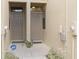 Two-unit entryway with taupe doors, ADT security at 5152 Bay Isle Cir, Clearwater, FL 33760