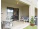 Relaxing patio with seating area and lush landscaping at 5152 Bay Isle Cir, Clearwater, FL 33760