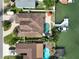 Directly above view of the property, highlighting the pool and boat dock at 565 Crystal Dr, Madeira Beach, FL 33708