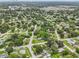 Aerial view of residential neighborhood with tree-lined streets at 6108 Pershing Ne St, St Petersburg, FL 33703