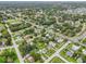 Aerial view of residential neighborhood with lush green landscaping at 6108 Pershing Ne St, St Petersburg, FL 33703