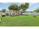Large backyard with grassy area and deck at 6108 Pershing Ne St, St Petersburg, FL 33703