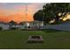 Spacious backyard with a fire pit and a deck at 6108 Pershing Ne St, St Petersburg, FL 33703