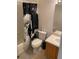 Clean bathroom with a tub shower combination and wood vanity at 6603 Osprey Lake Cir, Riverview, FL 33578