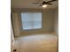 Well-lit bedroom with neutral carpeting and ample closet space at 6603 Osprey Lake Cir, Riverview, FL 33578