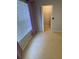 Bright bedroom with a large closet and window at 6603 Osprey Lake Cir, Riverview, FL 33578