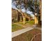 Townhome community with landscaped grounds at 6603 Osprey Lake Cir, Riverview, FL 33578