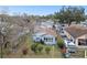 Aerial view of a light blue house with a yard and a truck parked outside at 704 E Broad St, Tampa, FL 33604