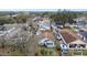 Aerial view of a light blue house with a boat in the backyard at 704 E Broad St, Tampa, FL 33604