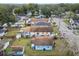 Aerial view of a light blue house with a large backyard and boat at 704 E Broad St, Tampa, FL 33604