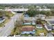 Aerial view showing a light blue house near a highway overpass at 704 E Broad St, Tampa, FL 33604