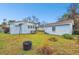 Large backyard with detached garage and shed at 704 E Broad St, Tampa, FL 33604