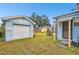 Backyard with detached garage and shed at 704 E Broad St, Tampa, FL 33604