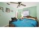 Spacious bedroom with a double bed and ceiling fan at 704 E Broad St, Tampa, FL 33604