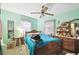Comfortable bedroom with a double bed and dresser at 704 E Broad St, Tampa, FL 33604