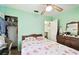 Well-lit bedroom with a double bed and closet at 704 E Broad St, Tampa, FL 33604