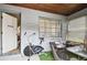 Sunroom with exercise equipment and seating at 704 E Broad St, Tampa, FL 33604
