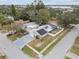 Aerial view of house featuring solar panels and a pool in the backyard at 7101 69Th N St, Pinellas Park, FL 33781