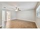 Spacious bedroom with tile flooring and ceiling fan at 7101 69Th N St, Pinellas Park, FL 33781