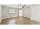 Well-lit bedroom, tile floors, and ceiling fan at 7101 69Th N St, Pinellas Park, FL 33781
