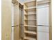 Large walk-in closet with shelves and hanging rods at 7101 69Th N St, Pinellas Park, FL 33781