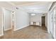 Bright dining room with hardwood floors and modern chandelier at 7101 69Th N St, Pinellas Park, FL 33781