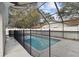 Inviting enclosed pool with safety fence, ideal for swimming and recreation at 7101 69Th N St, Pinellas Park, FL 33781