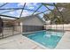 Enclosed pool area with safety fence offering privacy and security at 7101 69Th N St, Pinellas Park, FL 33781