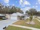 House exterior with a two-car garage at 7101 69Th N St, Pinellas Park, FL 33781