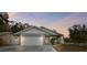 Updated one-story home with a two-car garage and landscaped lawn at 7101 69Th N St, Pinellas Park, FL 33781