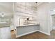 Renovated kitchen boasts granite countertops and stainless steel appliances at 7101 69Th N St, Pinellas Park, FL 33781
