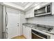 Modern kitchen featuring stainless steel appliances and white cabinets at 7101 69Th N St, Pinellas Park, FL 33781