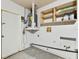 Laundry area with shelving and water heater at 7101 69Th N St, Pinellas Park, FL 33781