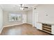 Bright living room with wood-look floors and a view of the backyard at 7101 69Th N St, Pinellas Park, FL 33781