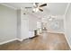 Open living area featuring wood-look tile floors and neutral walls at 7101 69Th N St, Pinellas Park, FL 33781