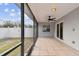 Spacious screened patio overlooking the backyard, perfect for outdoor enjoyment at 7101 69Th N St, Pinellas Park, FL 33781