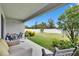 Spacious backyard with patio and seating at 7102 Wesley Palm Way, Wesley Chapel, FL 33545