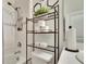 Clean bathroom with bathtub and shower at 7102 Wesley Palm Way, Wesley Chapel, FL 33545