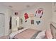 Bright bedroom with double bed and storage at 7102 Wesley Palm Way, Wesley Chapel, FL 33545