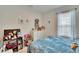 bedroom with a bed, dresser, and plenty of toys at 7102 Wesley Palm Way, Wesley Chapel, FL 33545