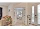 Guest bedroom with floral bedding and plenty of natural light at 7102 Wesley Palm Way, Wesley Chapel, FL 33545